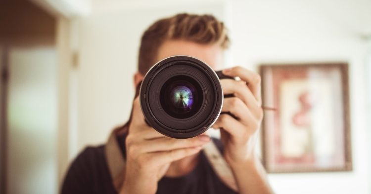 man holding a camera